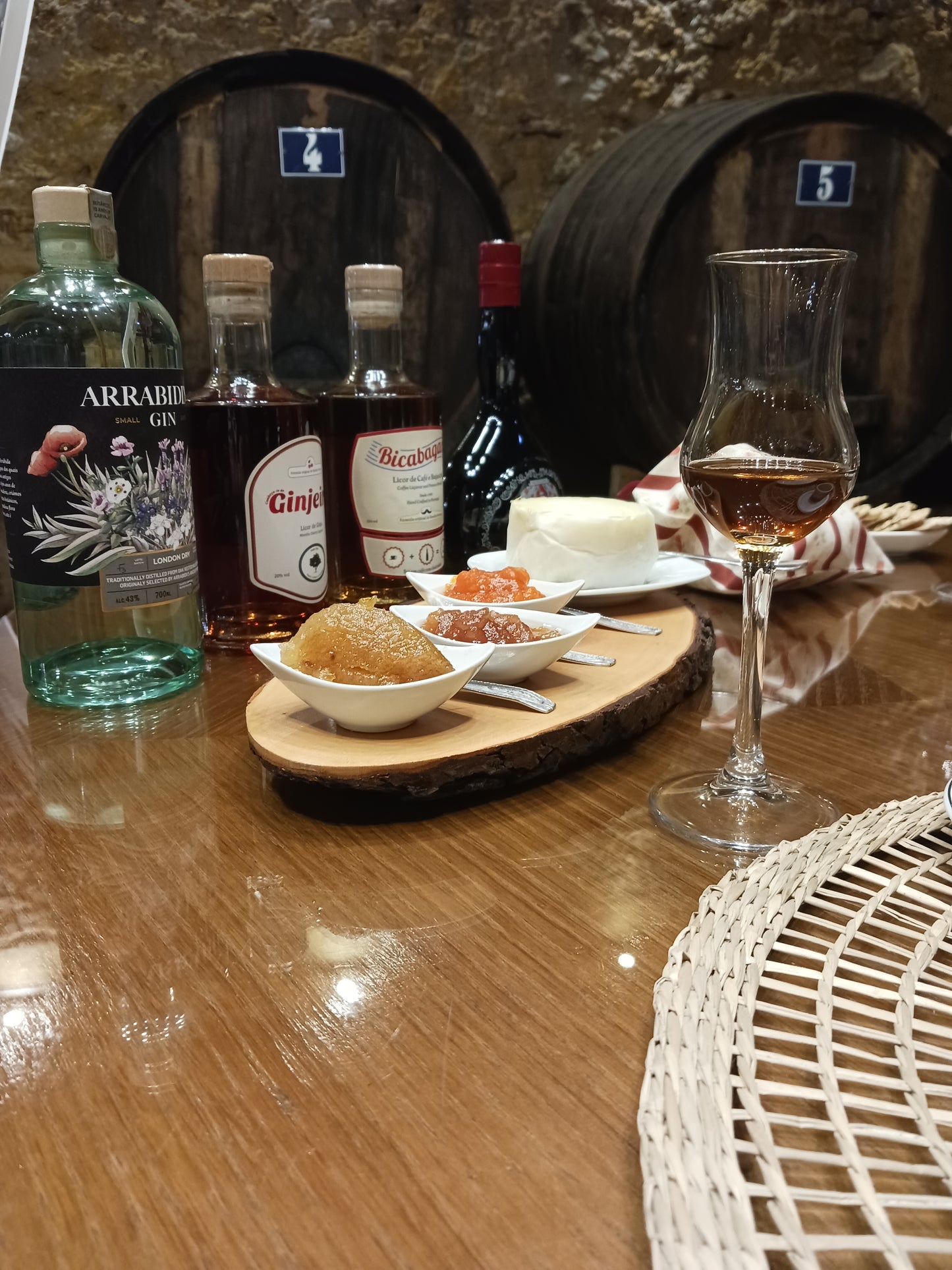 Artisanal spirits tasting in wine cellar, Arrábida Gin and local products, Setúbal Peninsula