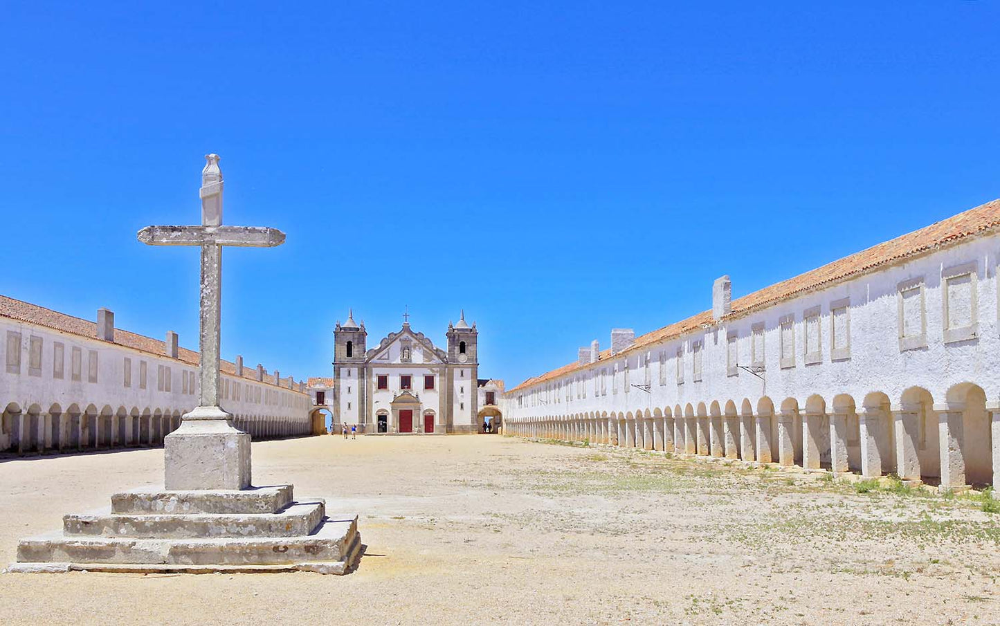 Santuario de Nossa Senhora do Cabo Espichel baroque church with stone cross and pilgrim arcade, historic coastal sanctuary, Setubal Peninsula, The Untold Weekend