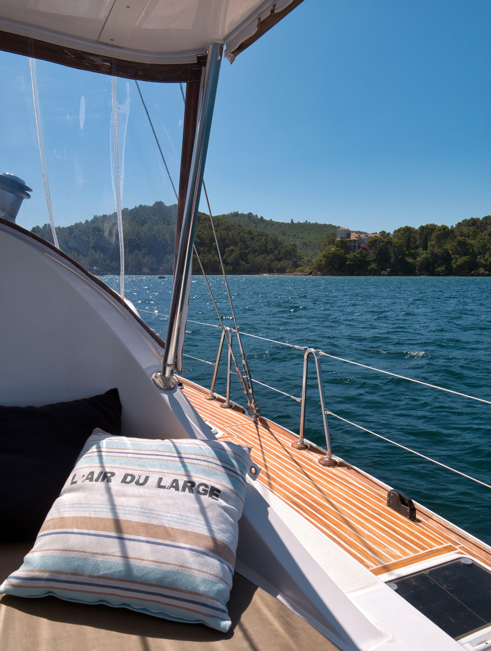 Sailboat deck overlooking Arrábida coastline and turquoise sea, Untold Blue private sailing experience