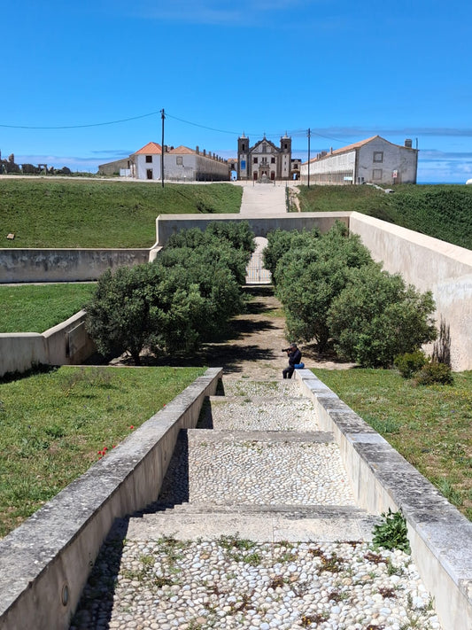 Santuario do Cabo Espichel sanctuary viewed from Casa da Agua with stone steps and formal garden leading to baroque church, historic coastal pilgrimage site, Setubal Peninsula, Segredos da Arrabida
